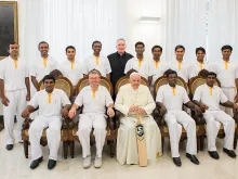 Pope Francis meets with the St. Peter's Cricket Club at the Vatican, Sept. 9, 2014. 