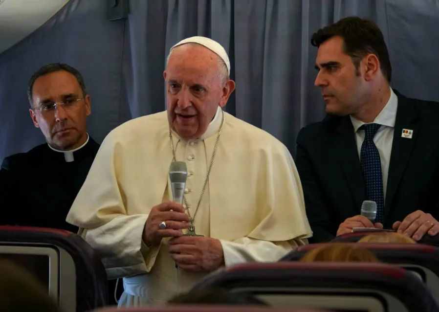 Pope Francis aboard the papal plane returning from Romania June 2, 2019. ?w=200&h=150