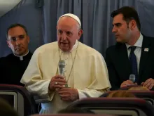 Pope Francis aboard the papal plane returning from Romania June 2, 2019. 