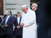 Pope Francis prays at the Piazza di Spagna, Dec. 8, 2015. 