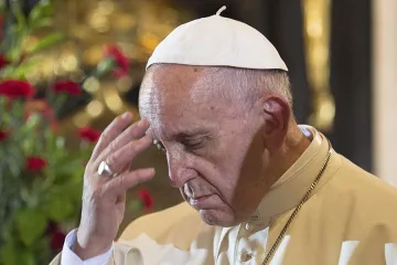 Pope Francis prays at the Wawel Cathedral in Krakow Poland on July 27 2016 Credit LOsservatore Romano CNA