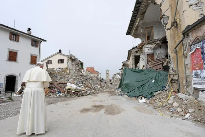 Pope Francis prays at the red zone in Amatrice during a private Oct 4 2016visit to those affected by a massive earthquake in August Credit LOsservatore Romano CNA