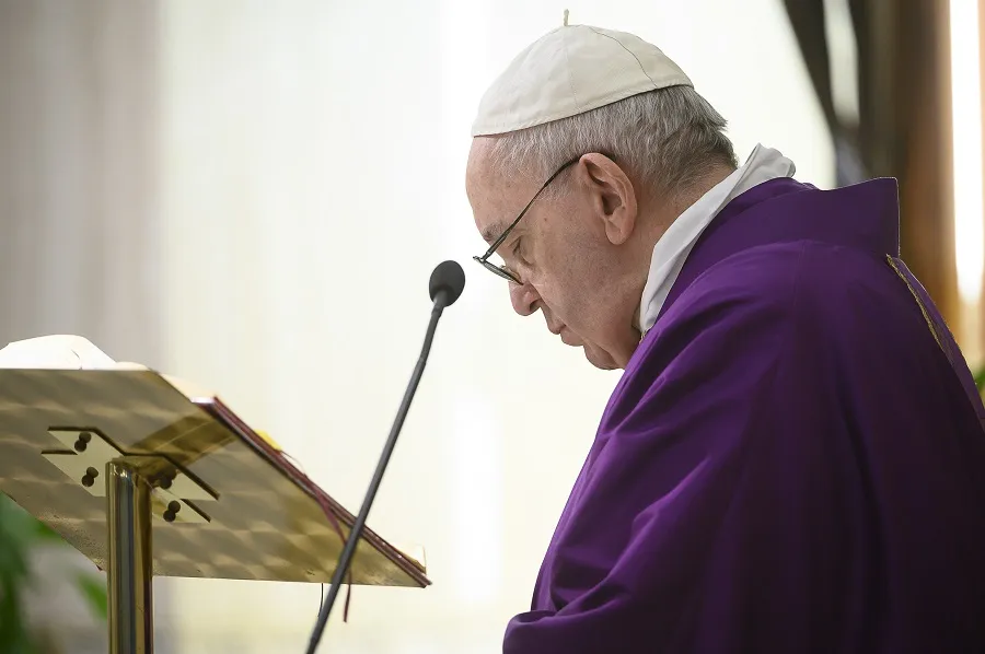 Pope Francis prays during Mass in Casa Santa Marta April 2, 2020. ?w=200&h=150