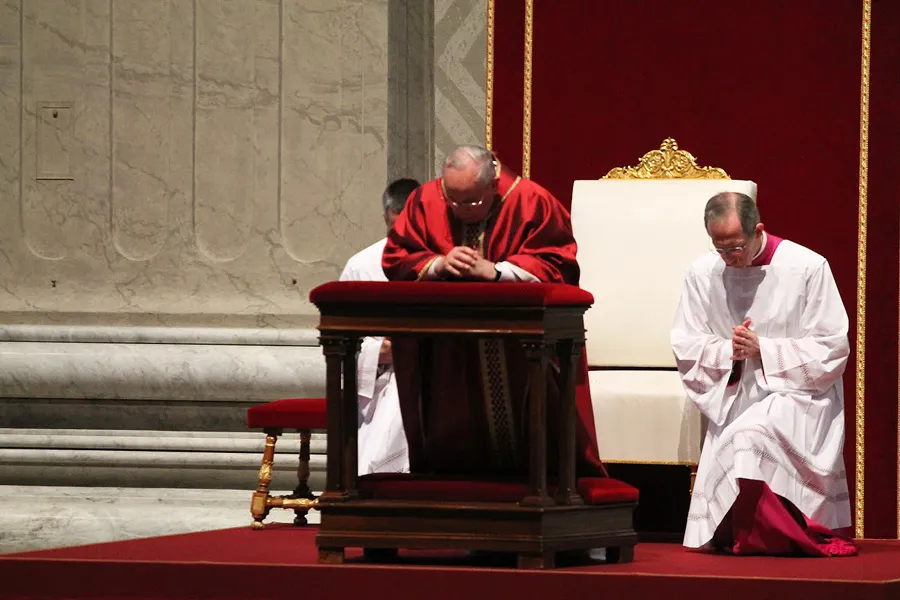 Pope Francis in prayer during the Liturgy of the Passion on Good Friday at St. Peter's Basilica, April 3, 2015. ?w=200&h=150