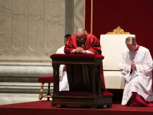 Pope Francis in prayer during the Liturgy of the Passion on Good Friday at St. Peter's Basilica, April 3, 2015. 