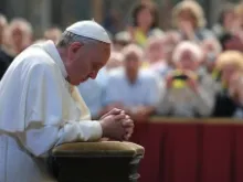 Pope Francis prays in front of Blessed John XXIII's tomb on June 3, 2013 in St. Peter's Basilica. 