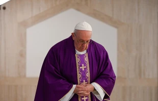 Pope Francis prays in the chapel of Casa Santa Marta March 16, 2020.   Vatican Media.