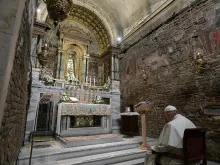 Pope Francis prays inside the Holy House of Loreto on the Feast of the Annunciation March 25, 2019. 