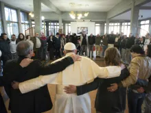 Pope Francis prays with staff and patients at  the Fr. Mario Picchi Italian Center for Solidarity in Marino, Feb. 26, 2016.