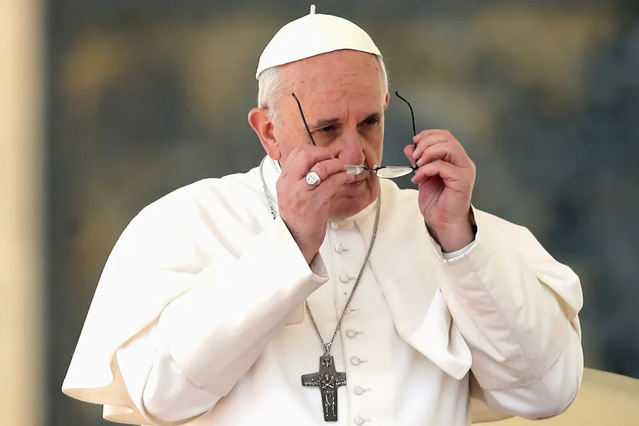 Pope Francis puts on his glasses during the general audience on March 27, 2013 in Vatican City. ?w=200&h=150