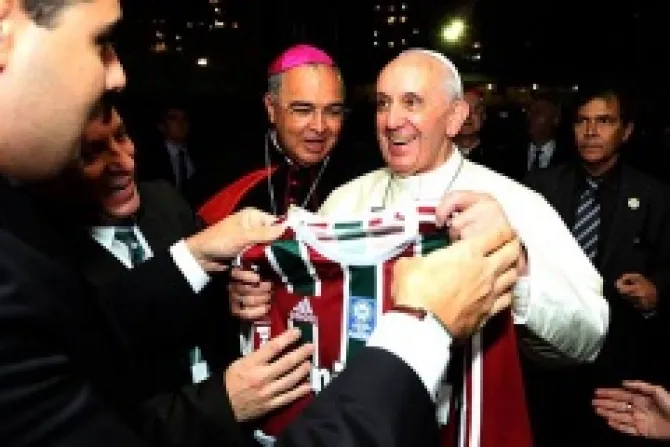 Pope Francis receives a soccer jersey from the Fluminense Football Club Credit Nelson Perez Fluminense FC CNA Catholic News 7 23 13