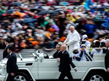 Pope Francis rides through St. Peter's Square May 15, 2019. 