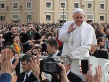 Pope Francis rides through St. Peters Square before a General Audience, April 3, 2013. 