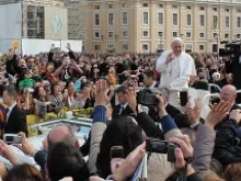 Pope Francis makes his way through St. Peter's Square during his April 3, 2013 general audience. 
