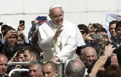 Pope Francis rides through St. Peter's Square on Palm Sunday, March 24, 2013. ?w=200&h=150