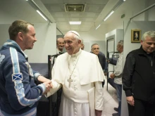 Pope Francis makes a visit to Rome's new dorms for homeless men on Oct. 15, 2015. 