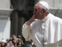 Pope Francis sends a kiss to someone in the crowd at the May 8, 2013 general audience in St. Peter's Square. 