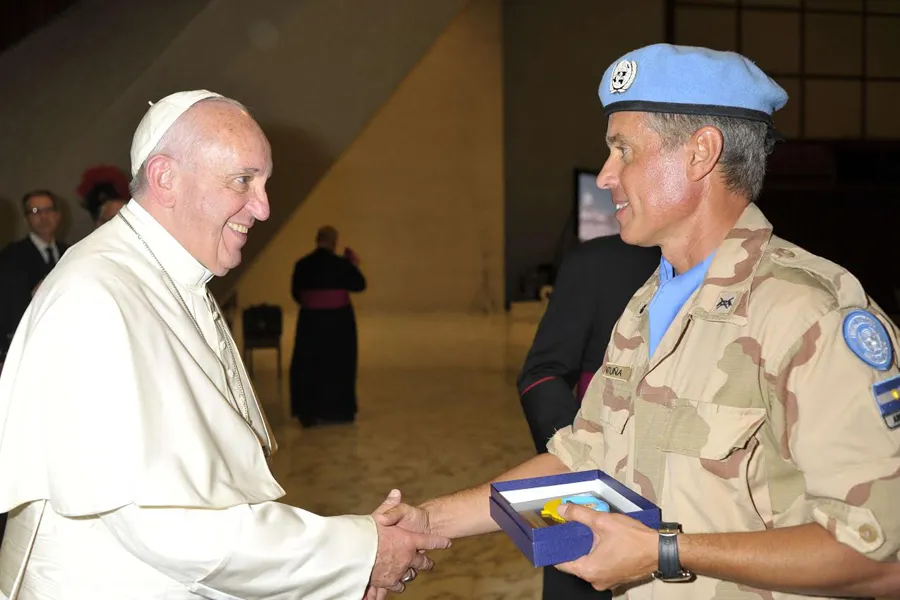 Pope Francis greets a United Nations peacekeeper from Argentina at the Vatican's Paul VI Hall, Aug. 5, 2015. ?w=200&h=150