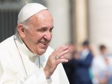 Pope Francis smiles in St. Peter's Square June 14, 2017. 