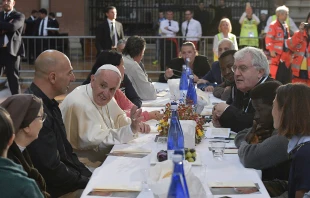 Pope Francis lunches with poor people, refugees, and the 18 prisoners who did not escape, at San Petronio Basilica in Bologna, Italy, Oct. 1, 2017.   L'Osservatore Romano.
