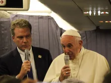 Pope Francis speaks aboard the papal plane from Lima, Peru to Rome Jan. 22, 2018. 