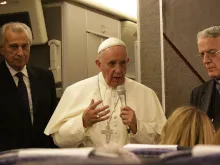 Pope Francis speaks to journalists on his flight from Philadelphia to Rome Sept. 27, 2015. 
