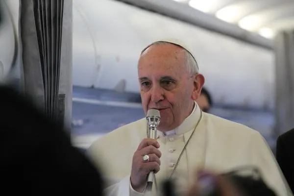 Pope Francis speaks to journalists on his way back from Strasbourg, Nov. 25, 2014. ?w=200&h=150