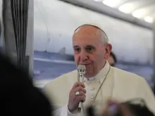 Pope Francis speaks to journalists on his way back from Strasbourg, Nov. 25, 2014. 