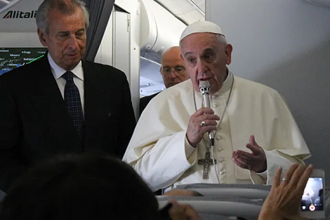 Pope Francis speaks to journalists on the papal flight en route to South Korea August 14 2014 Credit Alan Holdren CNA 2 CNA 8 14 14