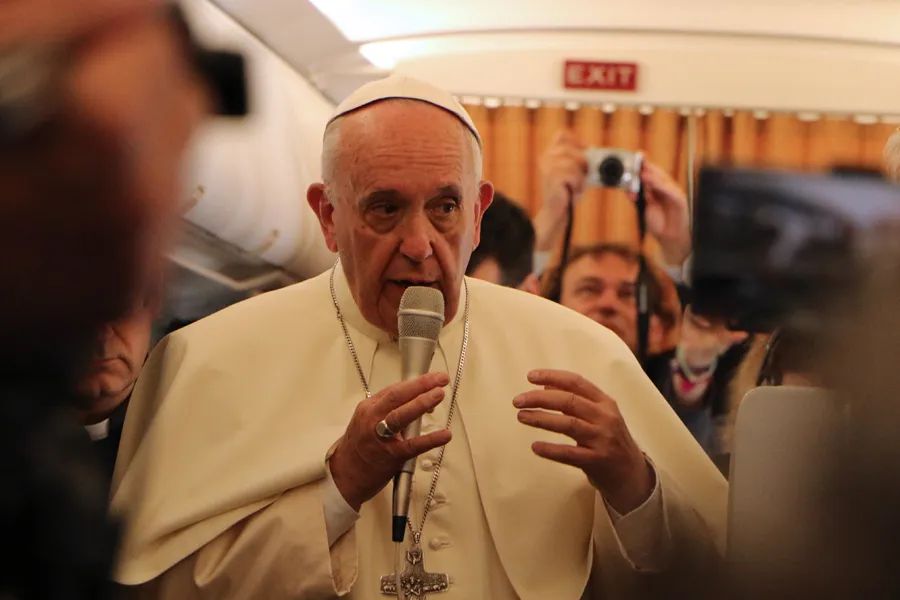 Pope Francis speaks to reporters aboard the papal flight to Armenia, June 24, 2016. ?w=200&h=150