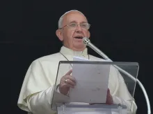 Pope Francis speaks to the crowd gathered in St. Peter's Square on June 15, 2015 before the Angelus. 