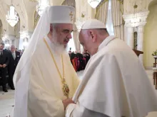 Pope Francis speaks with Romanian Orthodox Patriarch Daniel in Bucharest May 31, 2019. 