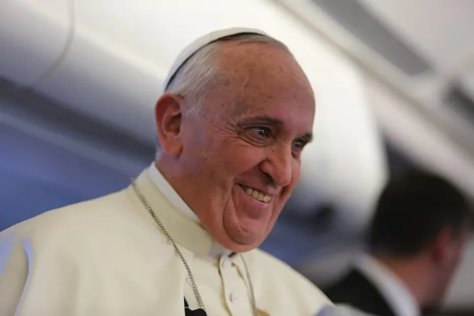 Pope Francis speaks with journalists on his flight from Sri Lanka to the Philippines on Jan. 15, 2015. ?w=200&h=150