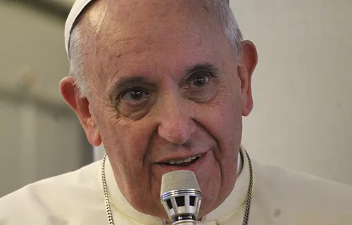 Pope Francis speaks with journalists on the papal plane August 18, 2014. ?w=200&h=150