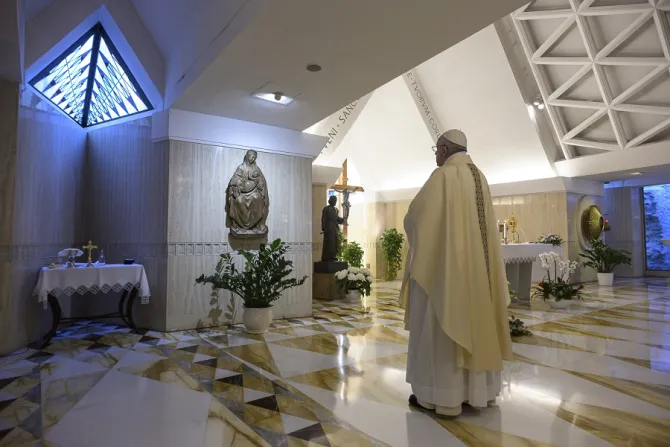 Pope Francis stops before a statue of Mary in the chapel of the Casa Santa Marta May 4 2020 Credit Vatican News