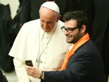 Pope Francis joins a selfie in Paul VI Hall on April 30, 2015. 