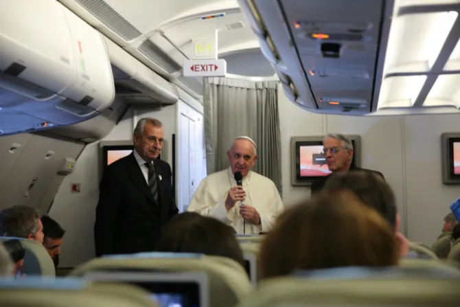 Pope Francis talks to journalists on plane to Manila Jan 15 2015 credit alan cna cna