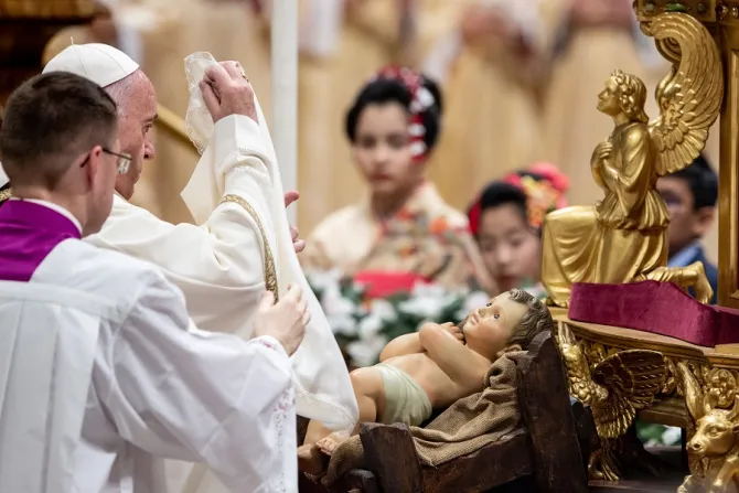 Pope Francis uncovers the Child Jesus Dec 24 2019 Credit Daniel Ibanez CNA