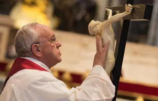 Pope Francis venerates the cross on Good Friday 2015.   Vatican Media/CNA