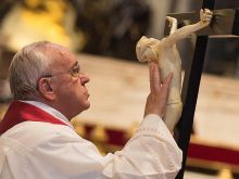 Pope Francis venerates the cross on Good Friday, 2015. 