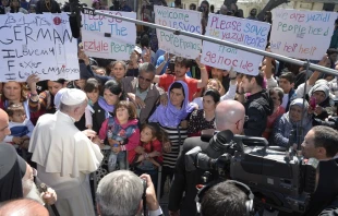 Pope Francis visits refugees at Mòria refugee camp on the Greek island of Lesbos April 16, 2016.   L'Osservatore Romano.