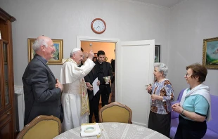 Pope Francis blesses a home in Ostia, Italy, May 19, 2017.   L'Osservatore Romano.