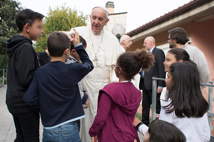 Pope Francis visits children at the SOS Village in Rome, Oct. 14, 2016. ?w=200&h=150