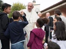Pope Francis visits children at the SOS Village in Rome, Oct. 14, 2016. 