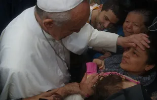 Pope Francis visits the community of Varginha, July 25, 2013.   Gustavo Kelly via JMJ Rio 2013-Flickr (CC BY-NC-SA 2.0).