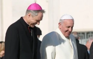 Pope Francis walks with Archbishop Georg Ganswein in St. Peter's Square during his Wednesday general audience on Dec. 4, 2013   Kyle Burkhart/CNA