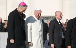 Pope Francis walks with Archbishop Georg Ganswein in St. Peter's Square during the Wednesday general audience on Dec. 4, 2013 ?w=200&h=150