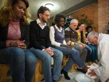 Pope Francis washes the feet of inmates at Rebibbia Prison in Rome, during the Mass of Holy Thursday, April 2, 2015. 