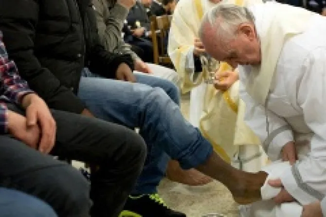 Pope Francis washes the feet of a juvenile detainee at Casal del Marmo on March 28 2013 Credit LOsservatore Romano CNA
