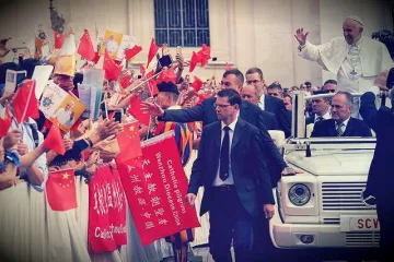 Pope Francis waves at pilgrims from China at the general audience in St Peters Square on September 7 2016 Credit Daniel Ibanez CNA
